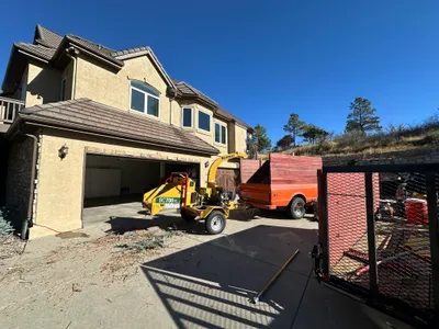 Farr Arbor truck and chipper at residential tree removal Parker CO